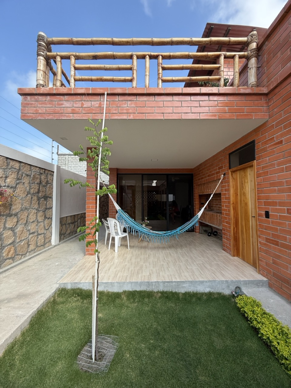 Patio gathering space with custom timber furniture